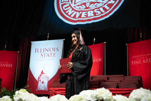 Illinois State graduate with diploma